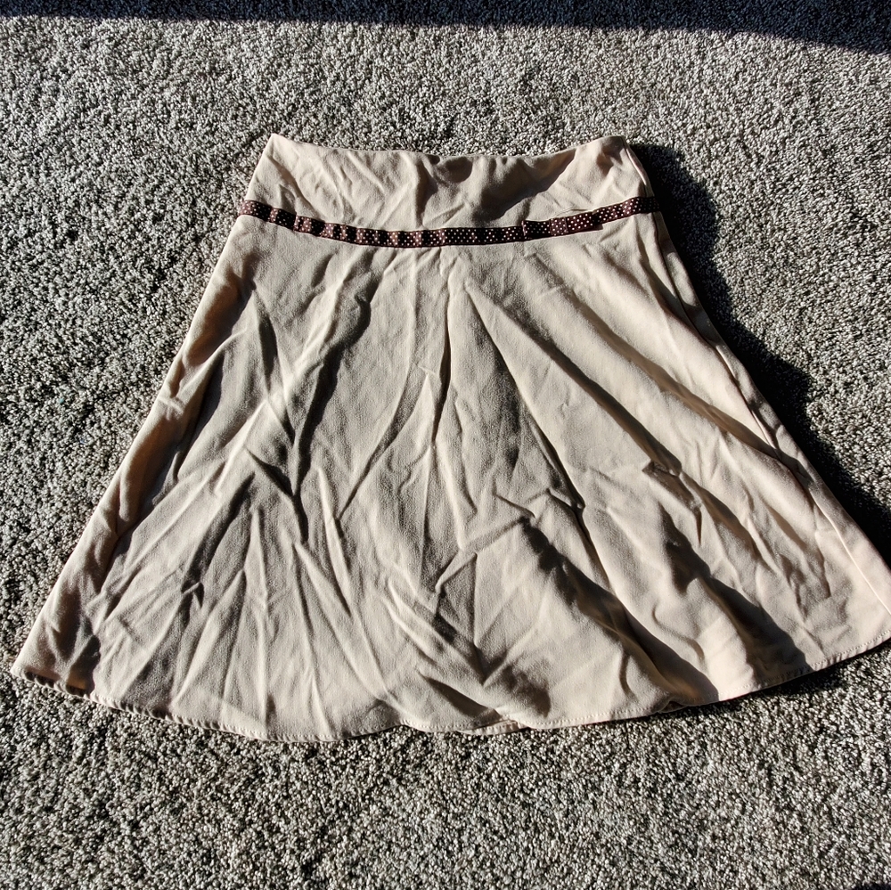 Tan skirt with brown ribbon bow